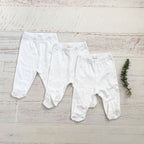 Pack de 3 patitas blancas para bebé: tres pantalones con puño elástico