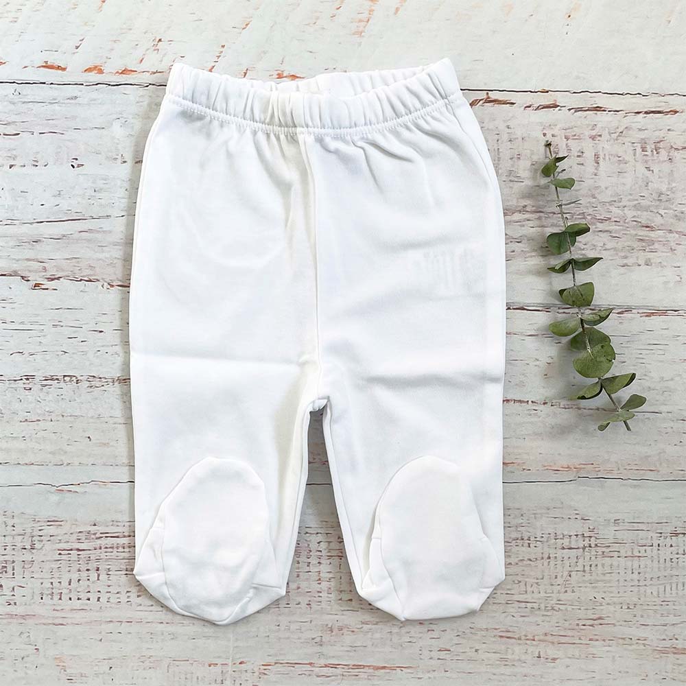 Pantalón infantil blanco tipo patitas con puños elásticos y cierre interior