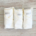 Pack de 3 bodies básicos blancos con borde picot amarillo y cierre a presión