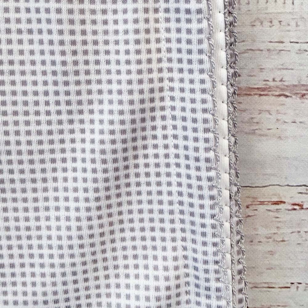 Borde de manta jacquard de cuadros con costura y flecos