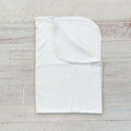 Manta jacquard blanca con borde fruncido y tejido liso al frente