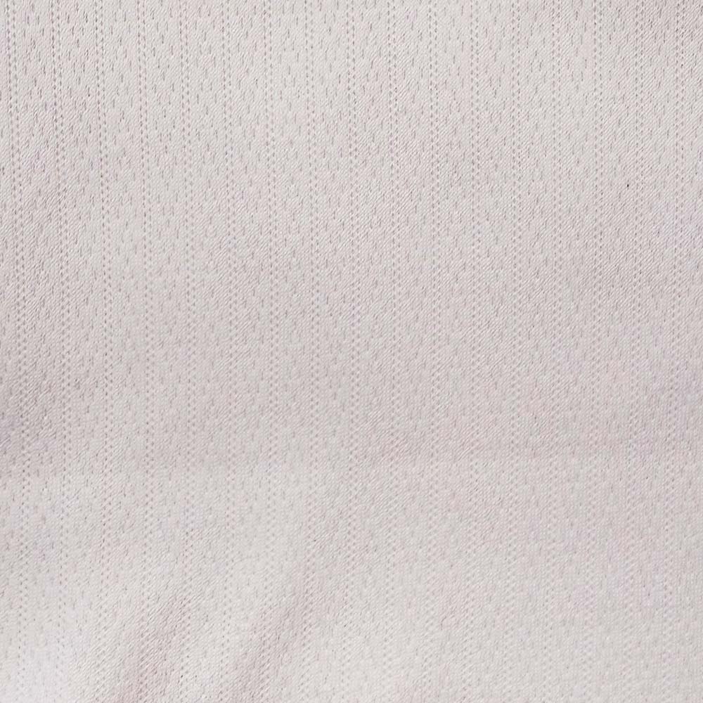 Tejido jacquard rosado de trama fina, superficie texturizada