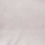 Tejido jacquard rosado de trama fina, superficie texturizada
