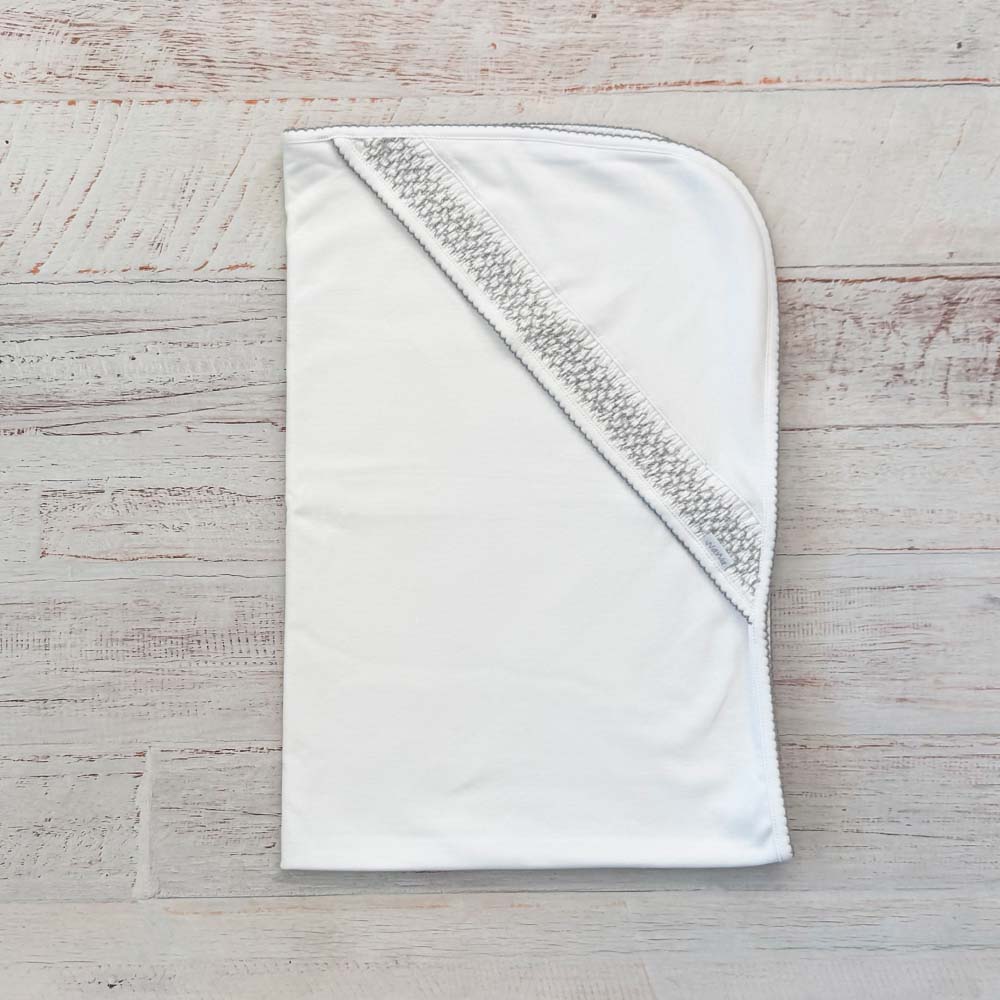 Manta smock gris con borde en diagonal y costura decorativa