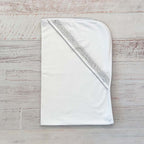 Manta smock gris con borde en diagonal y costura decorativa