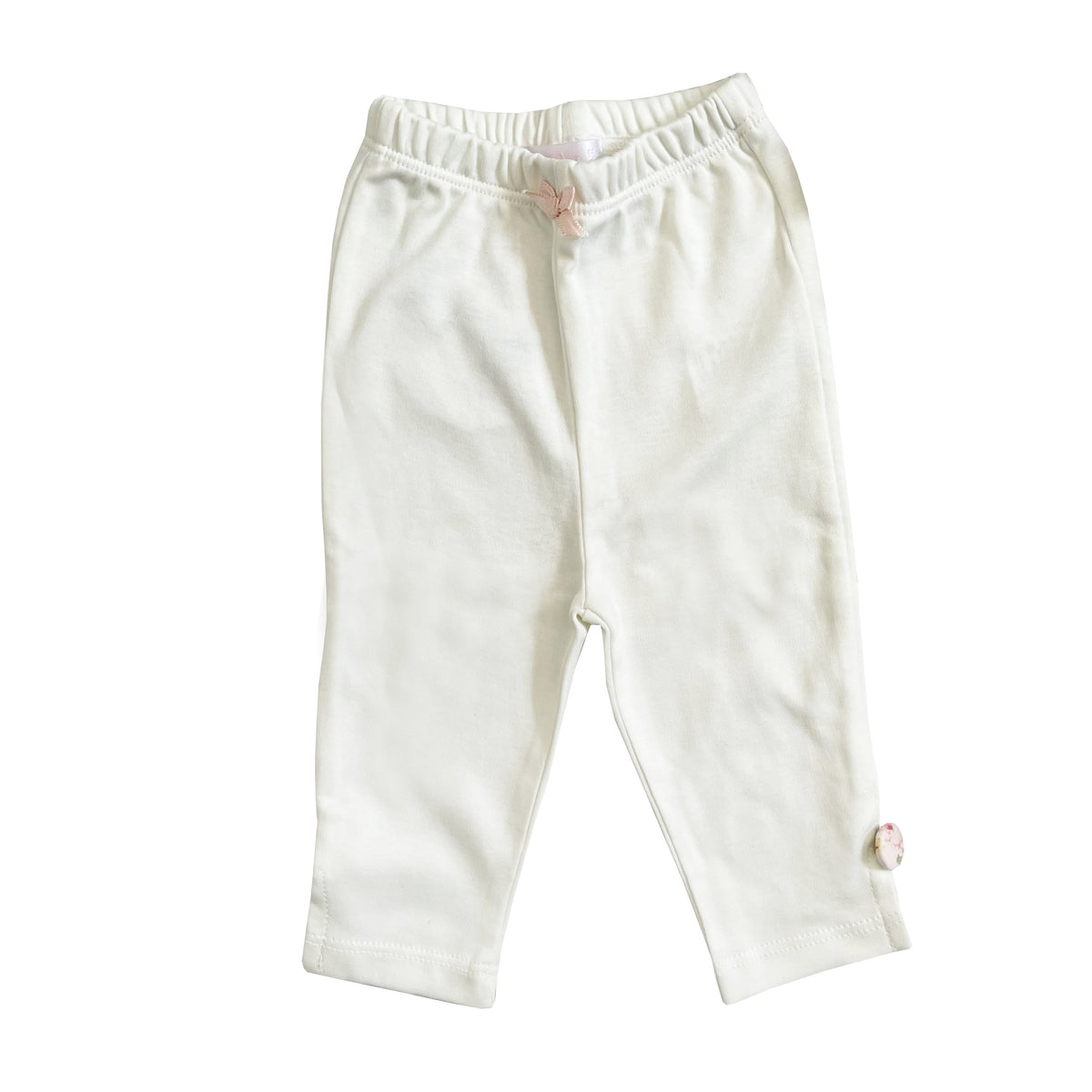 Leggings de algodón crema con costuras frontales y cintura elástica